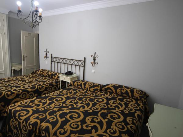 Hostal Roma : photo 7 de la chambre chambre triple