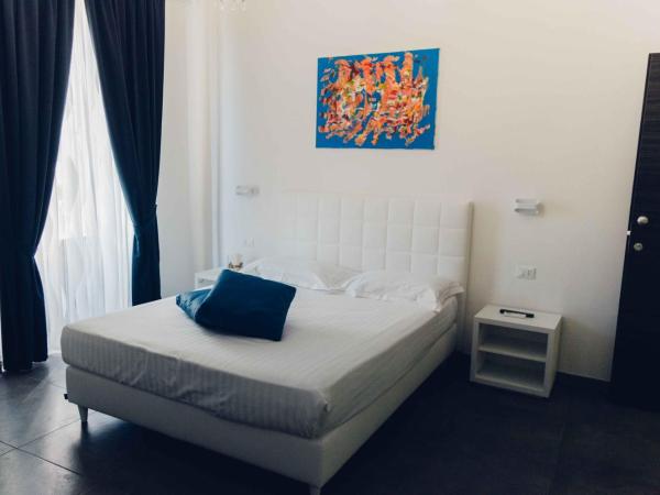 Etna Suite Group : photo 3 de la chambre chambre triple exécutive