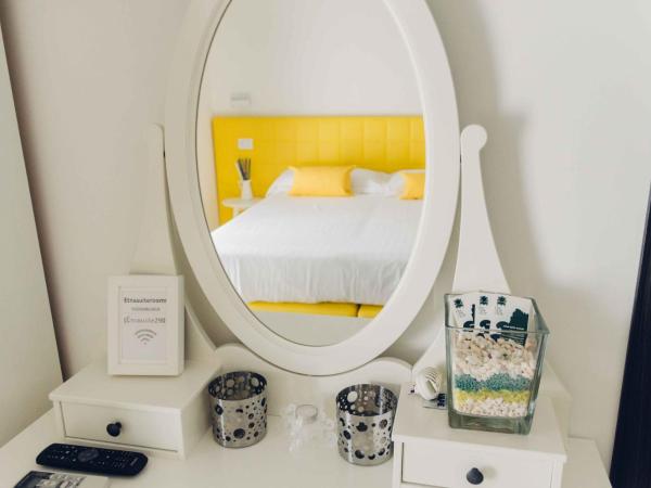 Etna Suite Group : photo 4 de la chambre chambre triple avec balcon