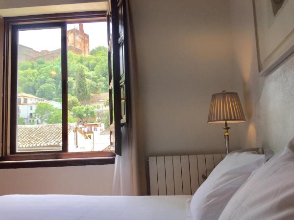 Palacio de Santa Inés : photo 10 de la chambre chambre double ou lits jumeaux - vue sur alhambra