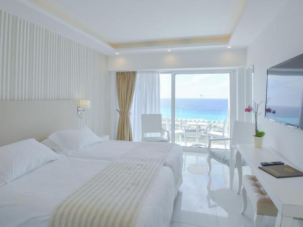 Ibiscus Hotel : photo 1 de la chambre chambre double/lits jumeaux - vue sur mer