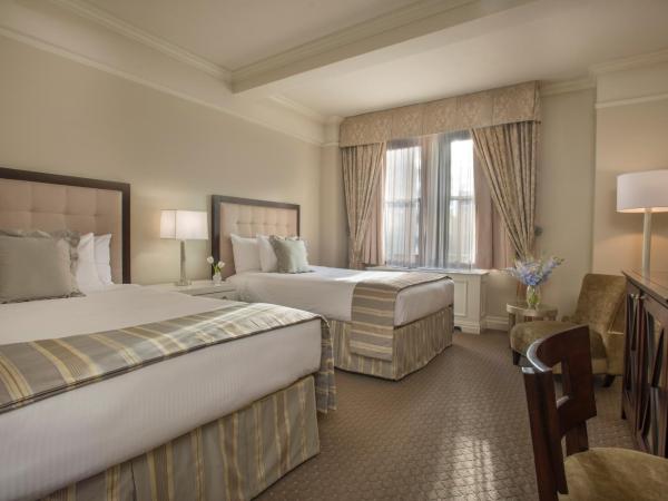 Warwick New York : photo 1 de la chambre hébergement premier avec 2 lits doubles - vue sur ville