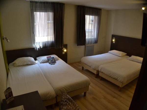 Hotel Primo Colmar Centre : photo 1 de la chambre chambre quadruple avec 4 lits simples