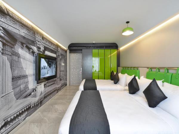 Regenta Central Antarim Ahmedabad : photo 5 de la chambre family room with 15% discount on food & beverages 
