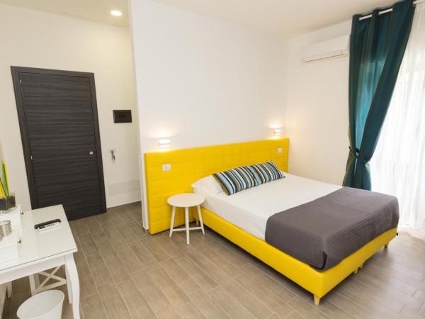 Etna Suite Group : photo 3 de la chambre chambre double ou lits jumeaux affaires