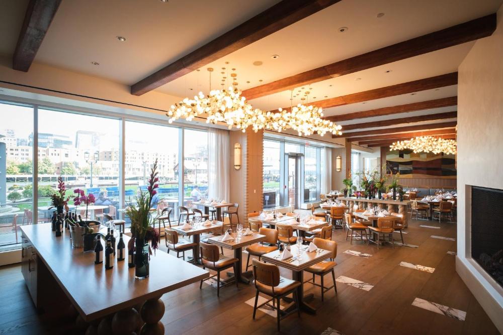 Restaurant with large windows and tables at InterContinental Boston