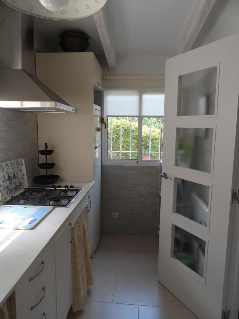 Casa con jardín frente Playa de Burriana 8