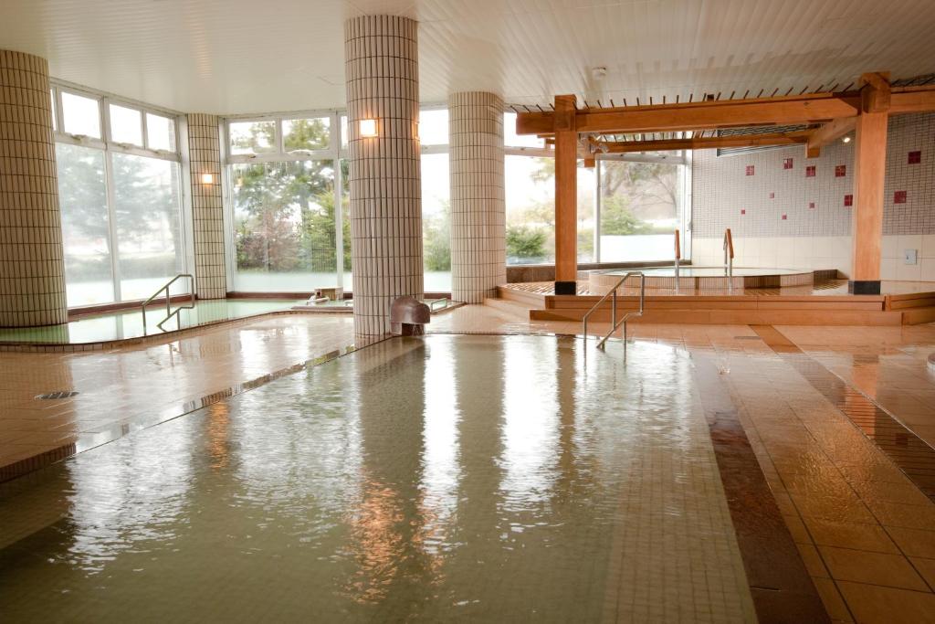 Chambre avec Piscine d'Eau dans un Bâtiment dans l'établissement Oehonke, à Kitami