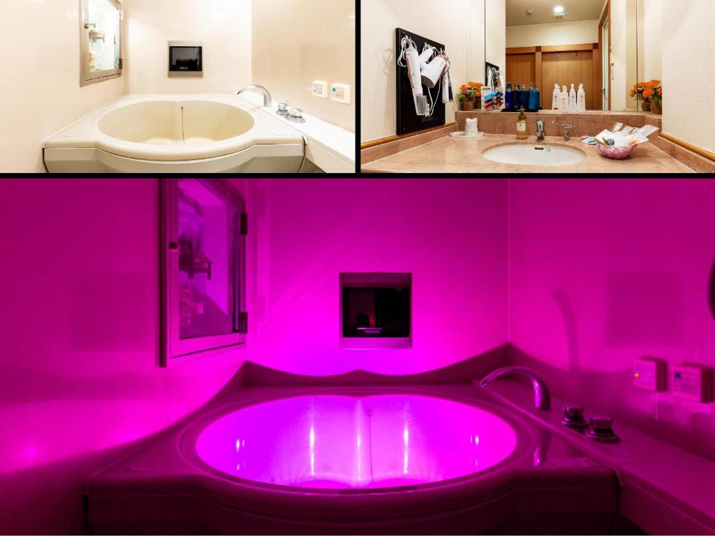 une baignoire rose dans une salle de bain avec un lavabo dans l'établissement Hotel Mine (Love Hotel), à Kurume
