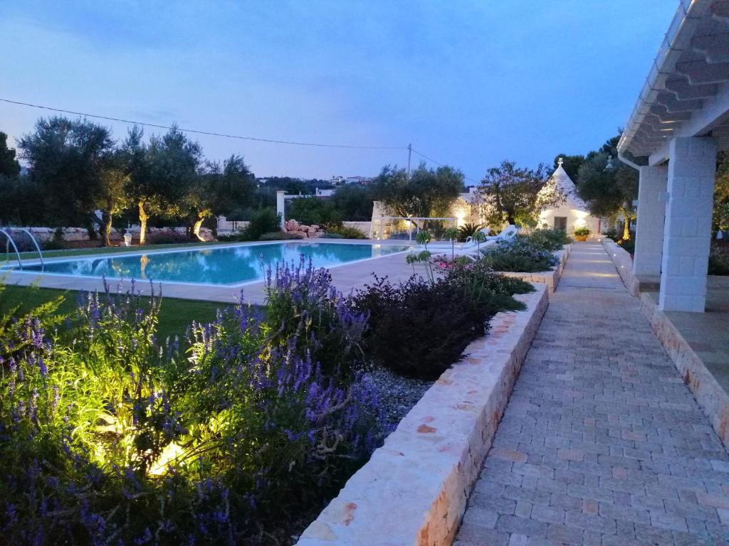 Photo de la galerie de l'établissement Trullo Genesi, à Cisternino 52 autres photos