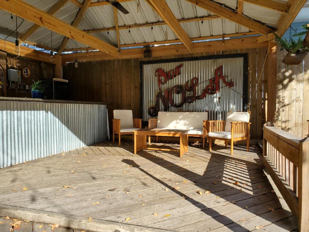 Macarty House, A Bohemian Resort with pool and cabana bar Image