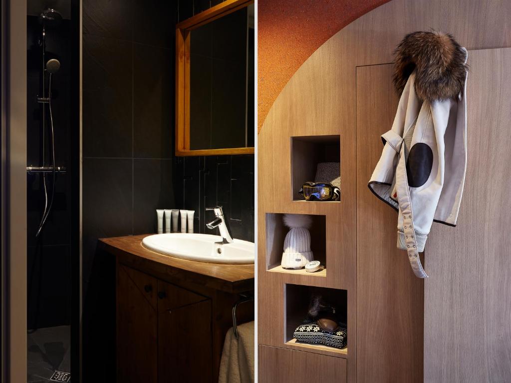 une salle de bain avec un lavabo et un miroir dans l'établissement Hôtel des Dromonts by SOWELL COLLECTION, à Avoriaz