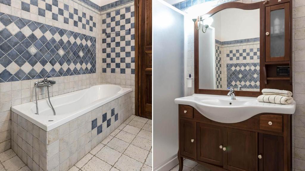 une salle de bain avec une baignoire et un lavabo dans l'établissement Villa Miki 10, Emma Villas, à Bruno