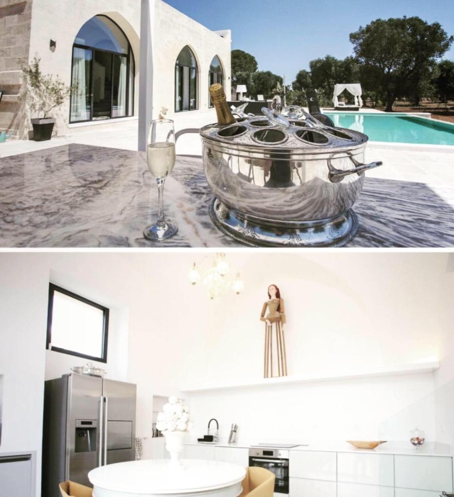 - une salle de bains avec un seau à vin à côté de la piscine dans l'établissement Villa Fontana, à Francavilla Fontana