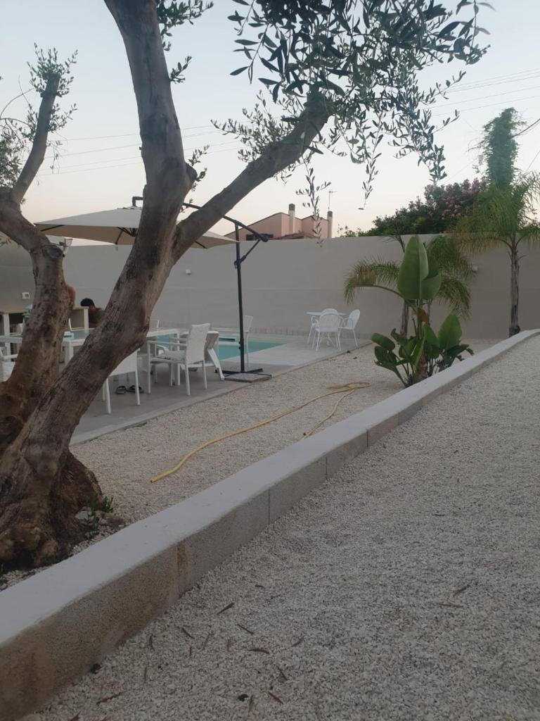 Photo de la galerie de l'établissement Luxury Bungalow, à Villaggio Azzurro