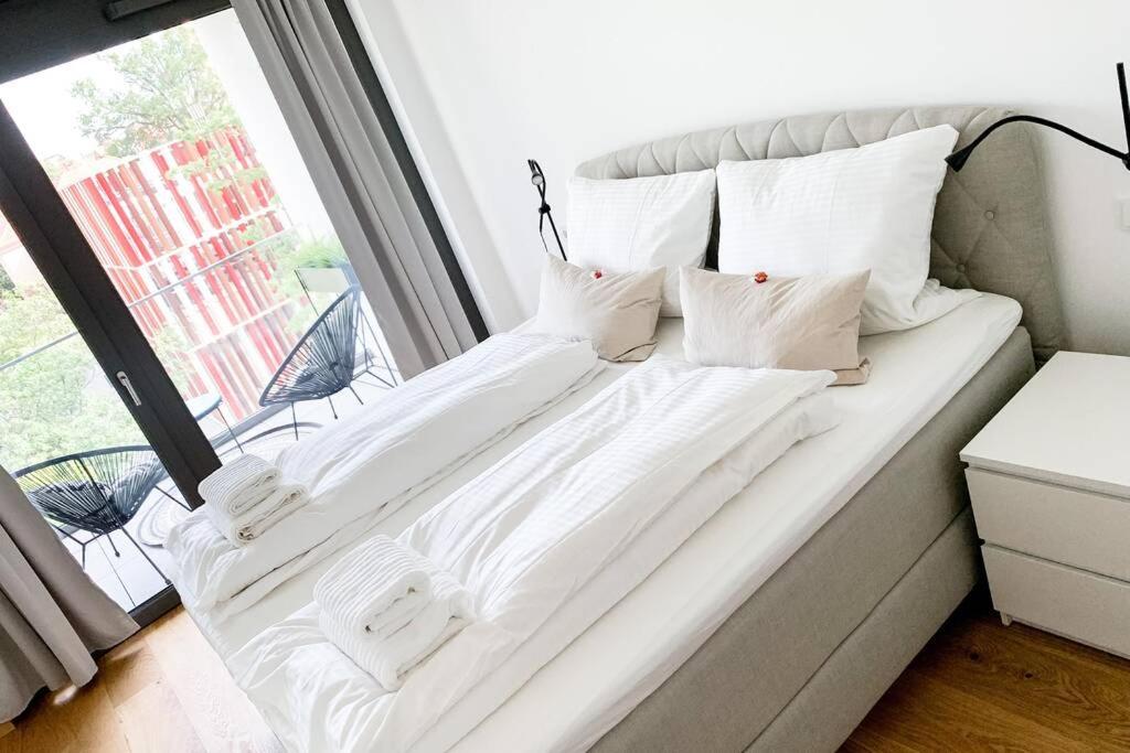 Luxuriöses Neubau-Apartment mit e-Lade Parkplatz 7