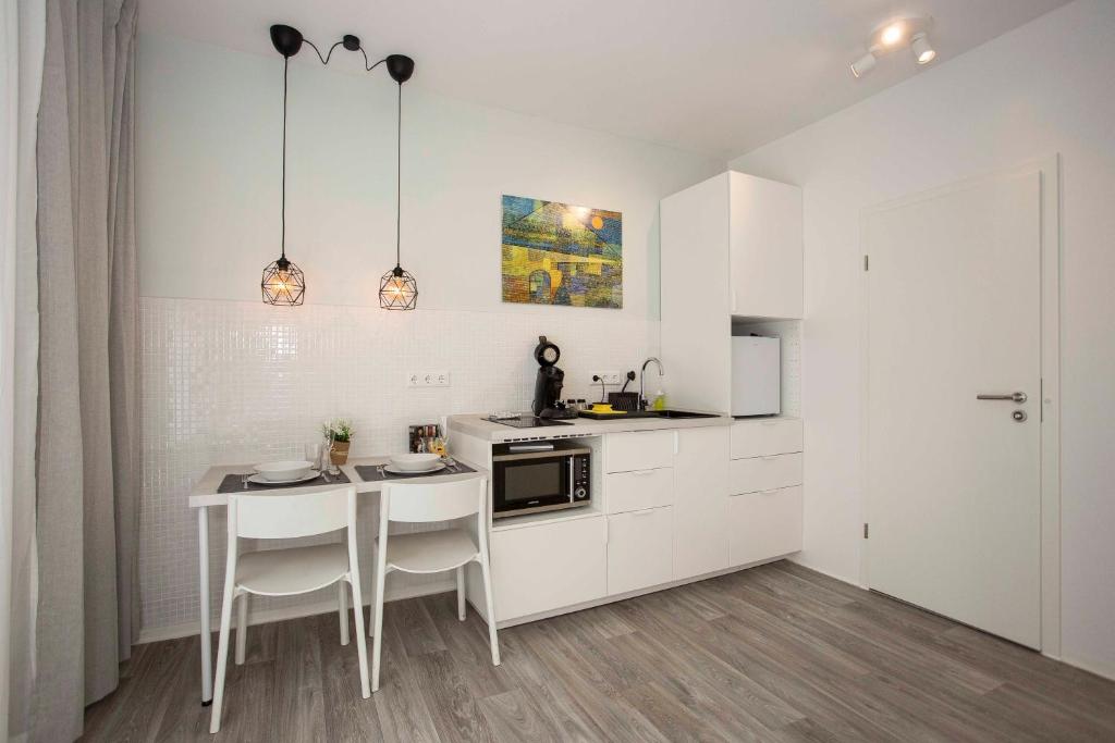 Studio Apartments - zentral mit Hinterhof-Flair 8