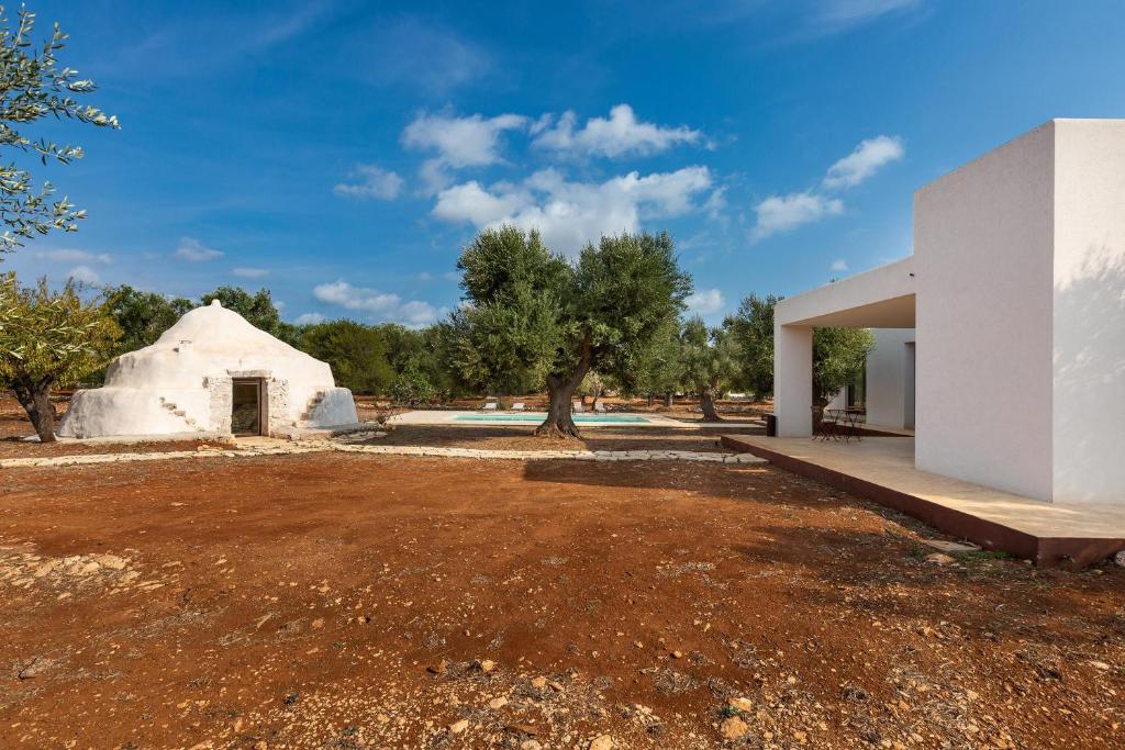 chambre aolithicolithicolithicolithicolithicolithicolithicolithicolithicolithicolithic house in a field dans l'établissement Villa Magali' by Perle di Puglia, à Specchiolla