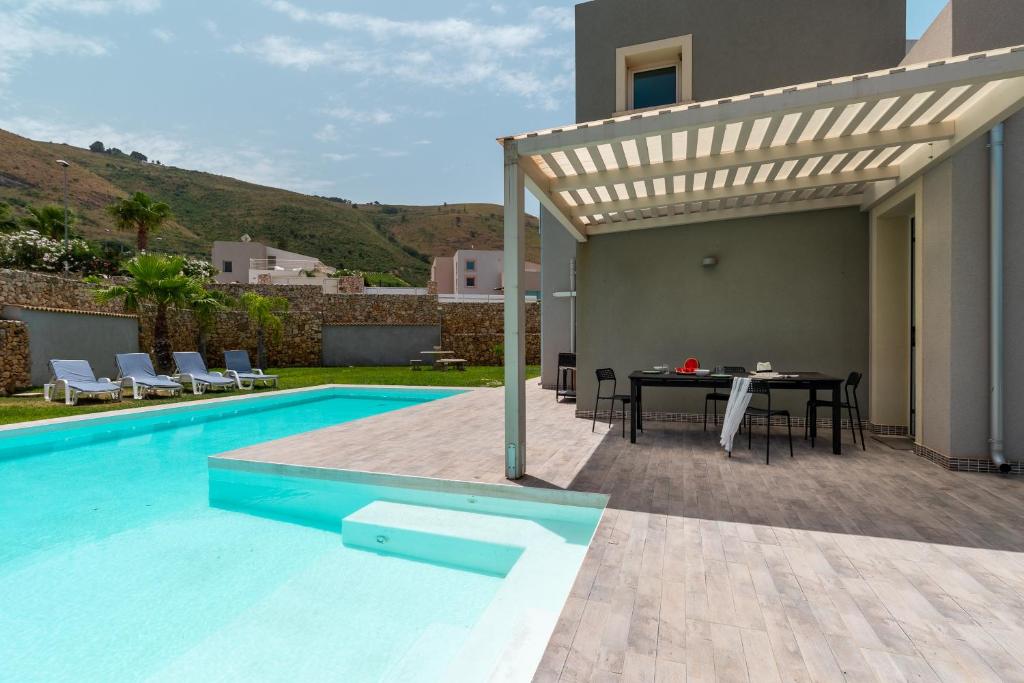 Photo de la galerie de l'établissement Nuova Villa a Scopello con piscina privata, à Balata di Baida