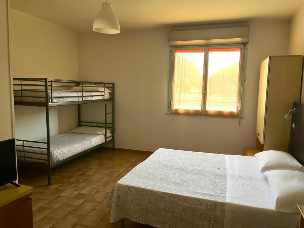 Un ou plusieurs lits dans un hébergement de l'établissement Hotel Nazionale