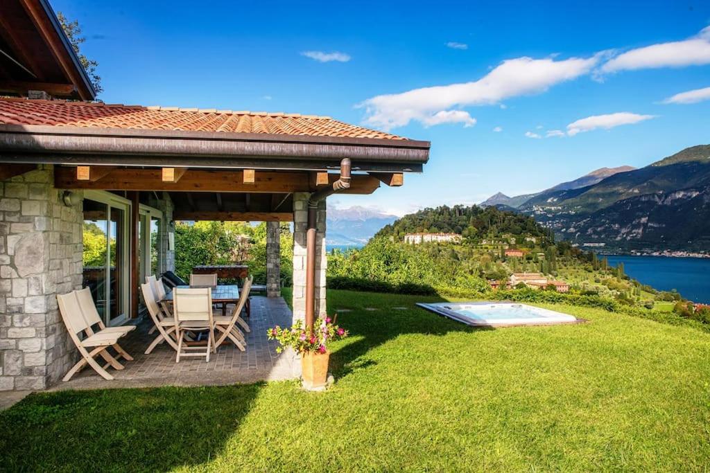 une cour arrière avec un gazebo, une table et des chaises dans l'établissement Villa Sissi, à Bellagio