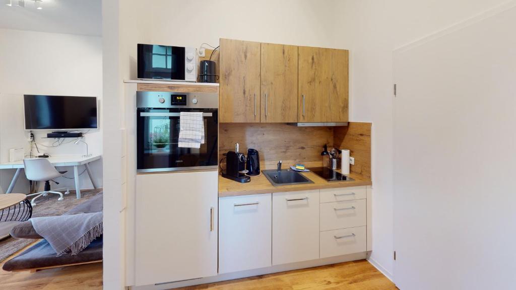 SweetHome - Business-Apartment mit Küche, Terrasse, Stellplatz 7