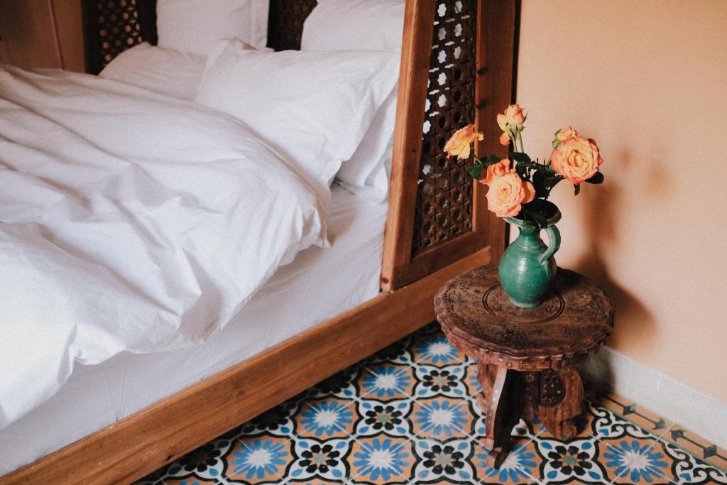 Un ou plusieurs lits dans un hébergement de l'établissement Riad Maison 24