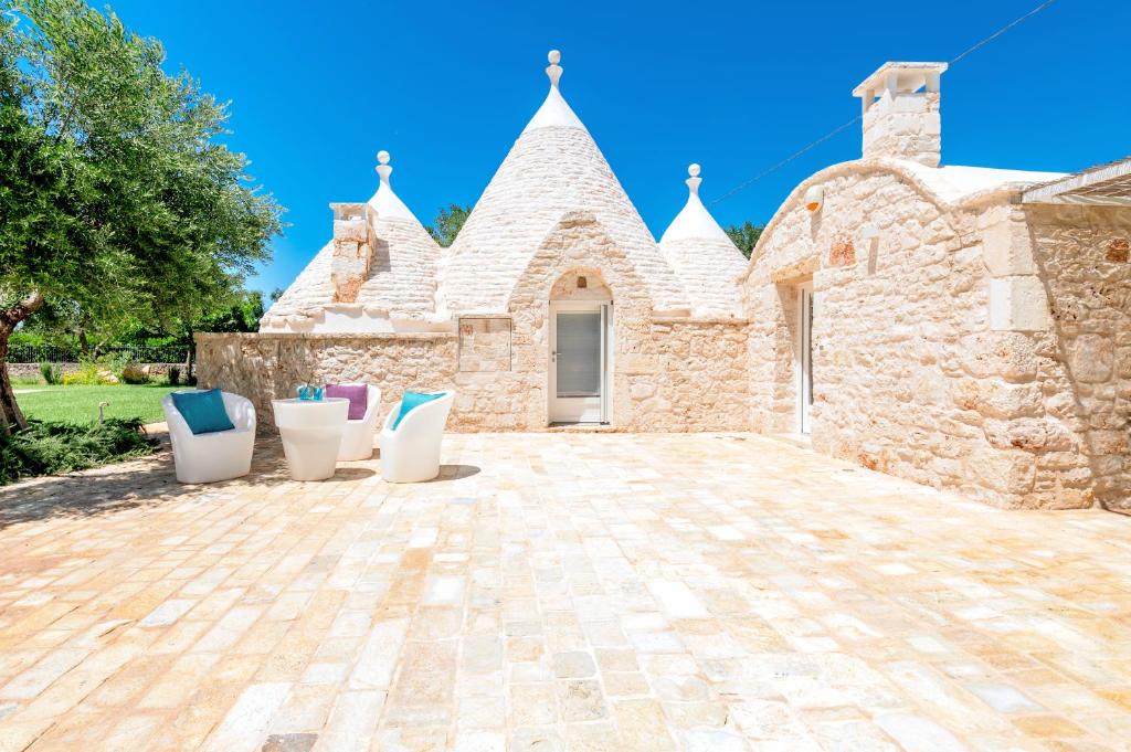 Photo de la galerie de l'établissement Trullo Zese con Piscina Privata, à San Michele Salentino