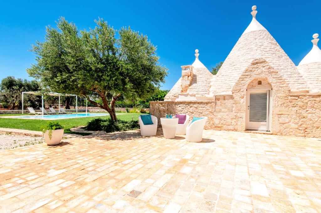 Photo de la galerie de l'établissement Trullo Zese con Piscina Privata, à San Michele Salentino