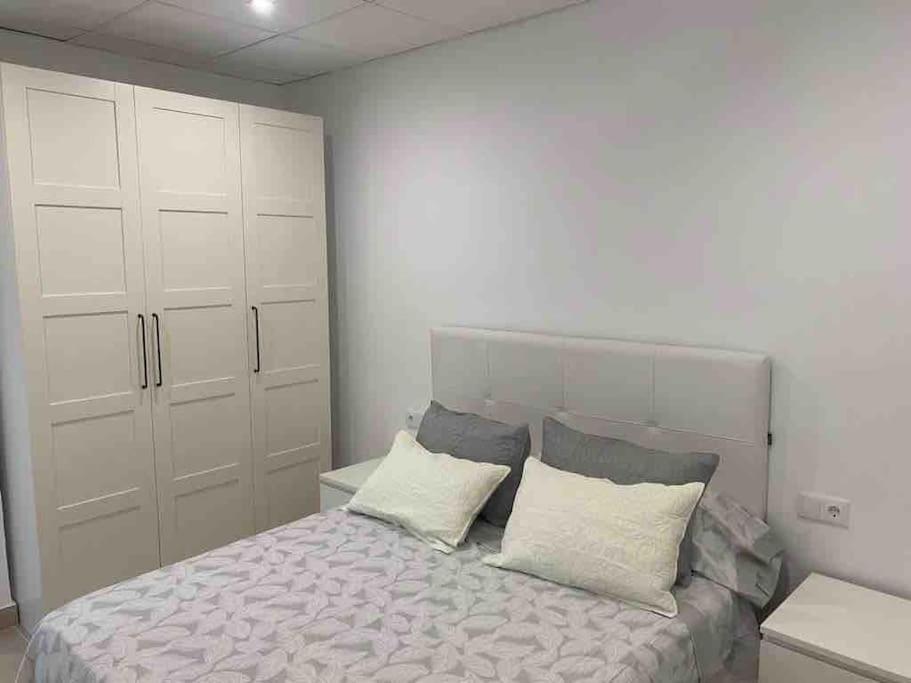 Planta baja moderna y nueva a estrenar en el centro ciudad 2 habitaciones y 2 baños 7