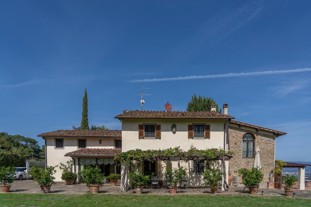 une image d'une maison dans l'établissement Tenuta le Viste - panoramic Villa, à Scandicci