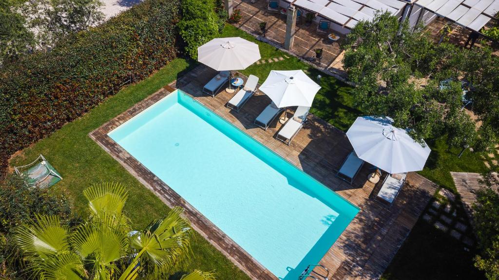 Photo de la galerie de l'établissement HelloAPULIA - Dimora Lamioni with private pool, à Polignano a Mare