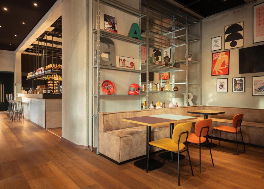 Restaurant ou autre lieu de restauration dans l'établissement Re Versiliana Hotel