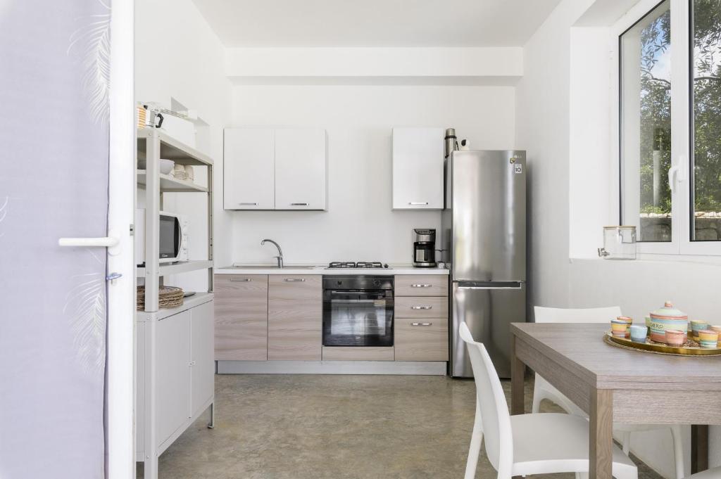 Photo de la galerie de l'établissement Trullo Chiara con piscina by Wonderful Italy, à Ostuni