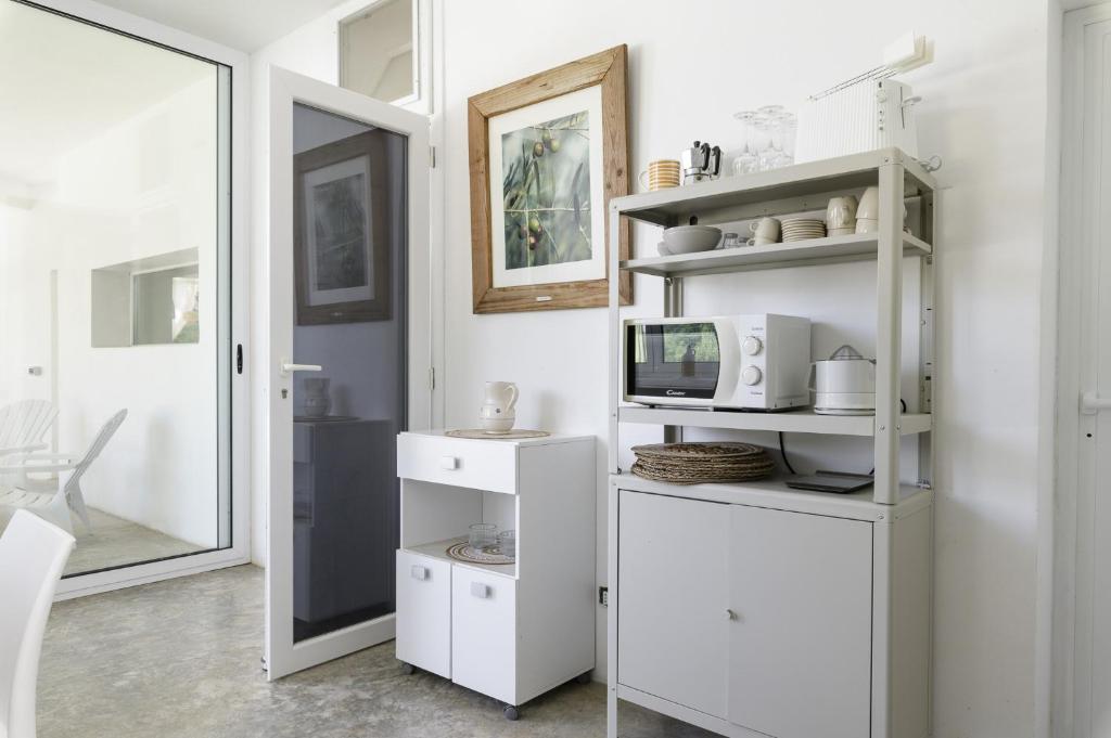 Photo de la galerie de l'établissement Trullo Chiara con piscina by Wonderful Italy, à Ostuni 23 autres photos