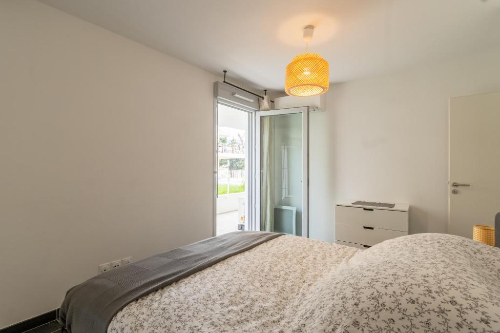 Appartement 70 m2 climatisé avec balcon et parking 2