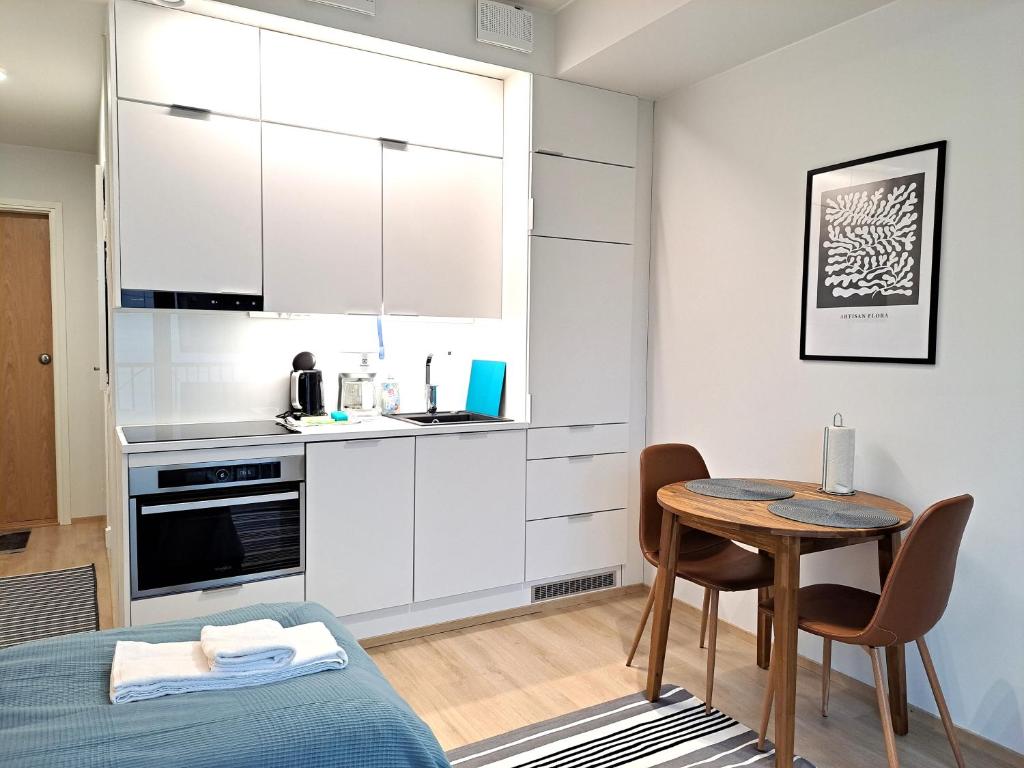 Kotimaailma Apartments - moderni keskustayksiö - Aleksanterinkatu 1
