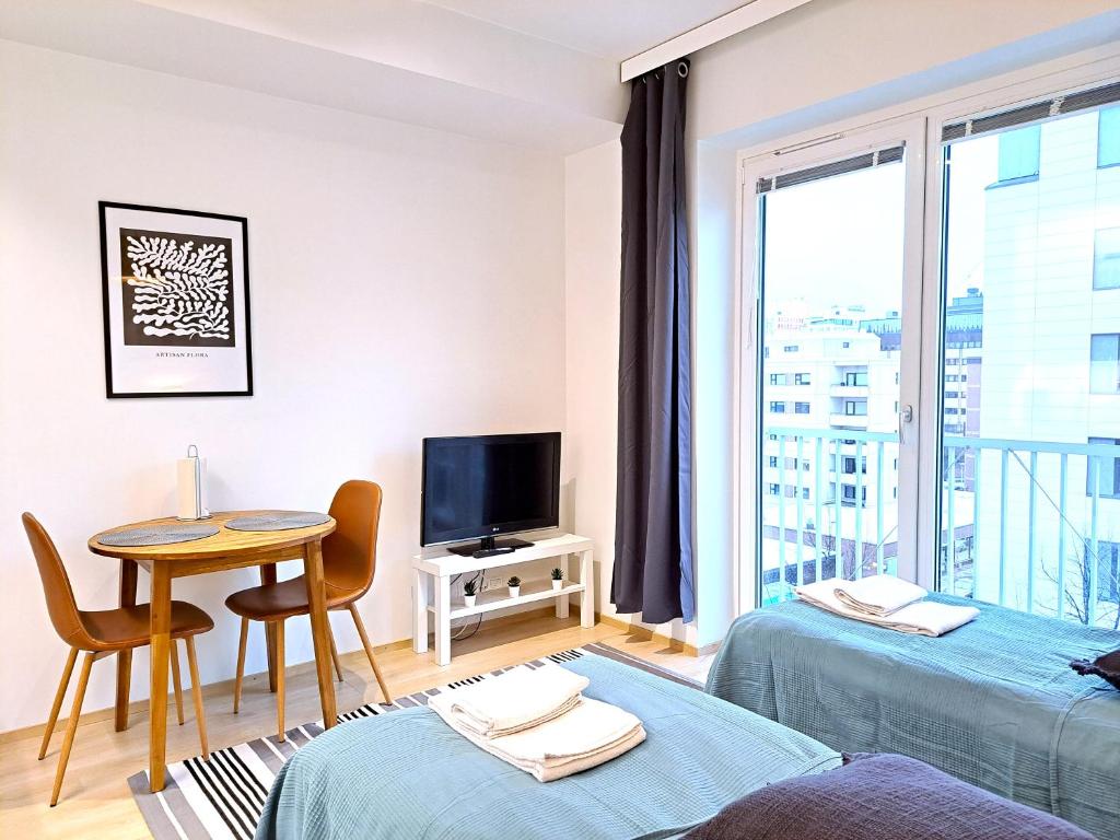 Kotimaailma Apartments - moderni keskustayksiö - Aleksanterinkatu 2