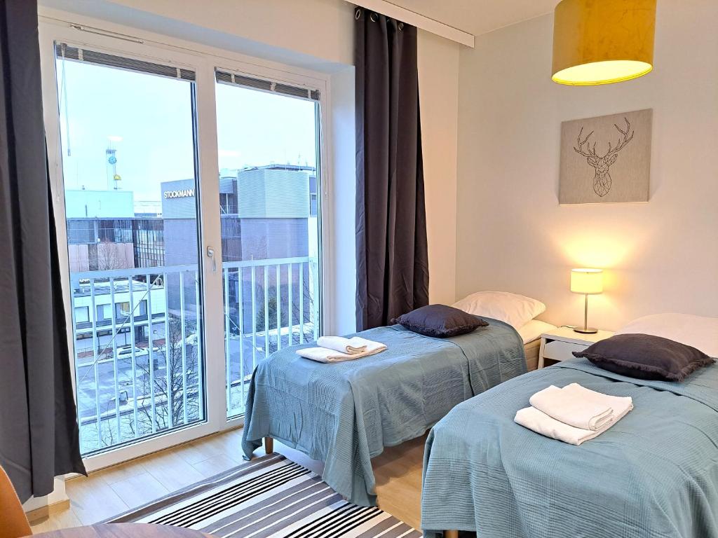 Kotimaailma Apartments - moderni keskustayksiö - Aleksanterinkatu 3