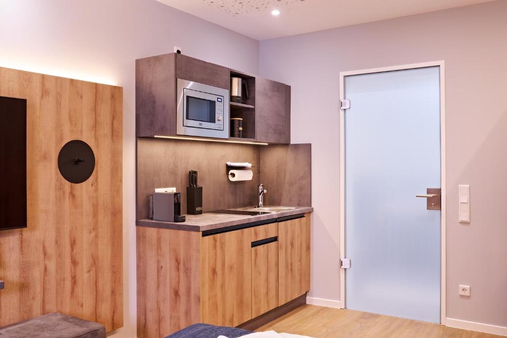 XZLLENZ Traum Studio-Apartment, Frei-Parken, U-Bahn, Küche 7