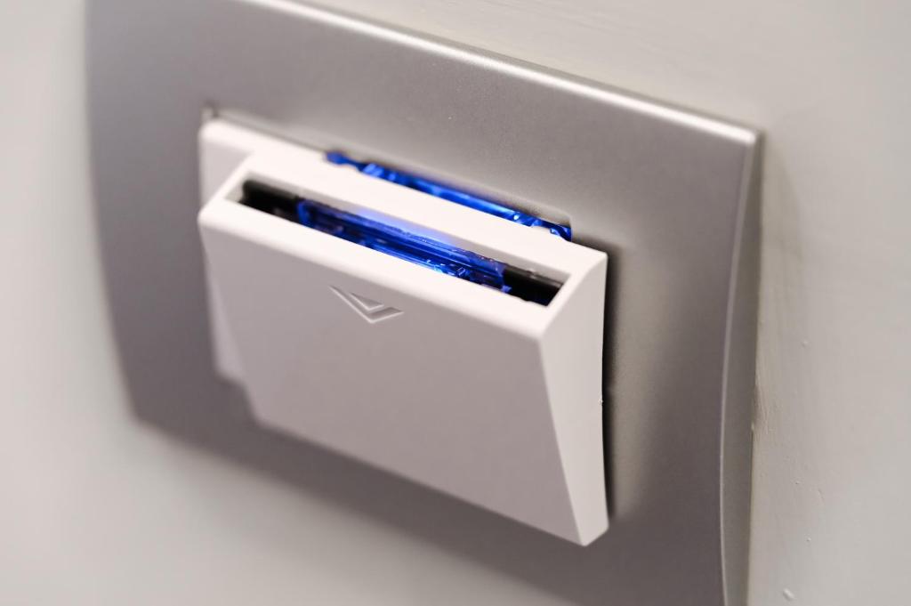 un objet métallique comportant un objet bleu dans l'établissement Domus Marina - Baltico Apartment, à Mondragone