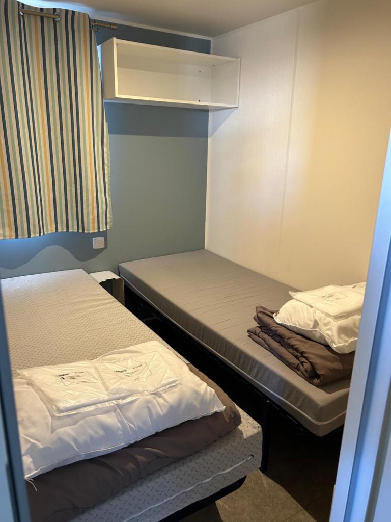 Photo de la galerie de l'établissement Camping la palmeraie 4* mobil home 3 chambres-6personnes, à Torreilles