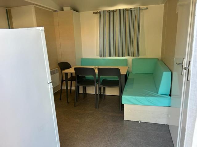 Photo de la galerie de l'établissement Camping la palmeraie 4* mobil home 3 chambres-6personnes, à Torreilles