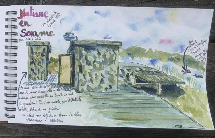 un carnet avec un dessin de pont dans l'établissement Nature en Somme, à Quend