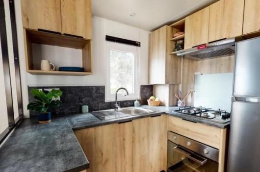 Photo de la galerie de l'établissement MH 6-8p - tt équipé - WIFI inclus - camping 4e bord de lac, à Gastes