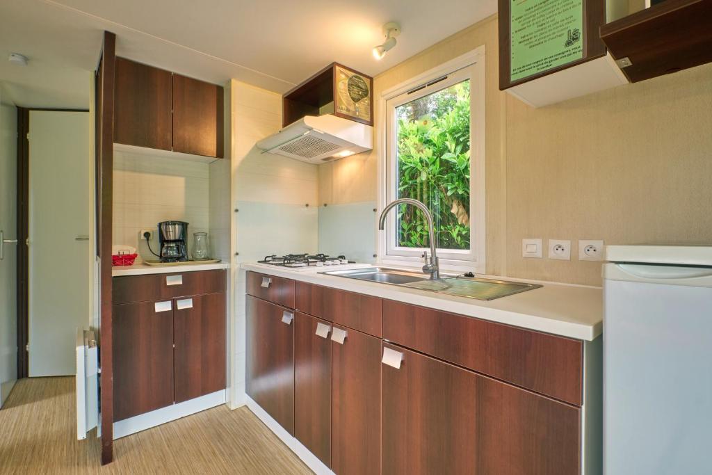 Photo de la galerie de l'établissement Mobil Home 4 personnes 208, à Mens