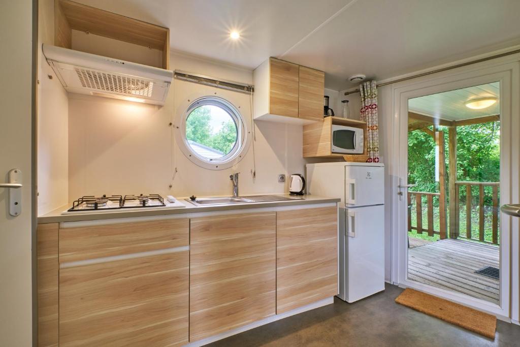 Photo de la galerie de l'établissement Mobil Home 4 personnes 204, à Mens