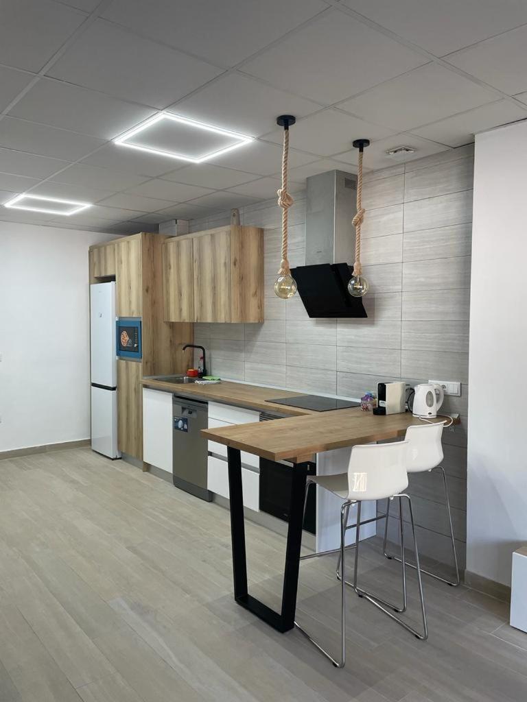Planta baja moderna y nueva a estrenar en el centro ciudad 2 habitaciones y 2 baños 4
