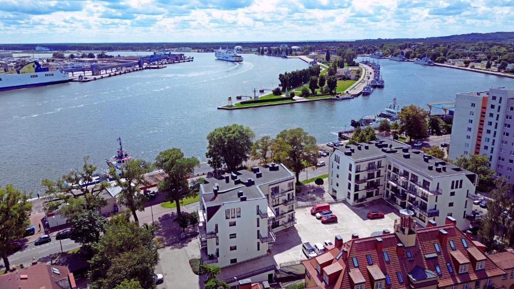 Sunset Apartments - Flotylla - Nowoczesne mieszkanie z widokiem na port, prywatny parking, blisko mariny jachtowej, Park Zdrojowy 1