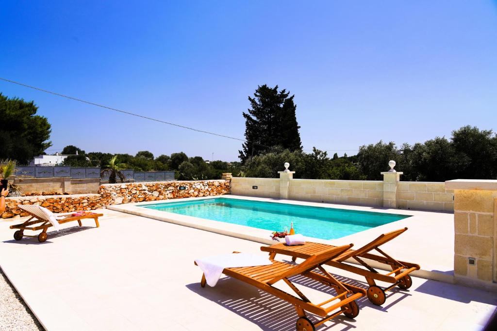 Photo de la galerie de l'établissement Villa D'Oliviers PRESTIGIOSA VILLA con PISCINA ad OSTUNI, à Ostuni